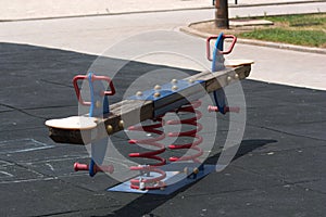 Close-up of a balance in a park dedicated to children`s play photo