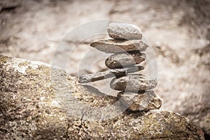 Balancing cairns in the forest