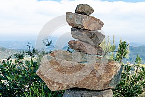 Zen pile of rocks made on the top of the mountain. California