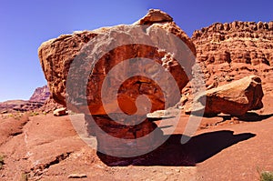 Balancing rock on tiny pedestal