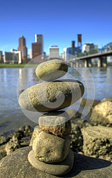 Balancing Rocks against City Skyline photo