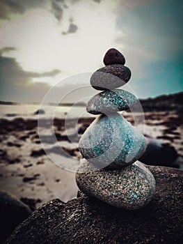 Balancing stones in the beach