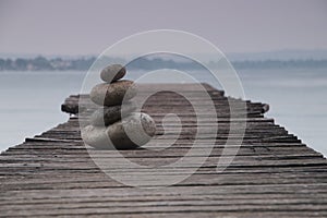 Balancing Stones on a Jetty