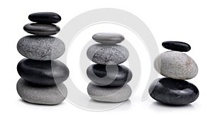 Balancing zen pebble stones isolated on a white background.