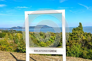 BalatongyÃ¶rÃ¶k szÃ©pkilÃ¡tÃ³ nice view view point with badacsony mountain in polaroid frame structure