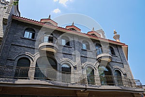 Balconied building with arch windows