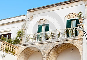 Balconies on a central square of the City of Ostuni, Apulia,  Italy