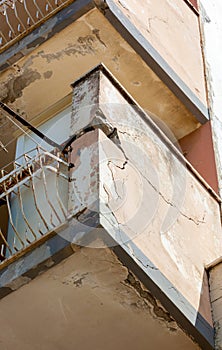 Balconies with cracked concrete and rusty irons requiring renovation