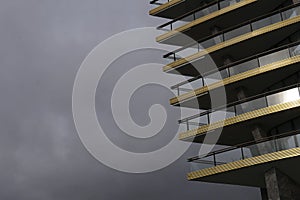 Balconies of multistory building landscape rain sky