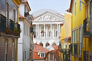 Balconies of old and colorful buildings on Travessa da Arrochela street on a sunny day in summer. Assembly of the Republic