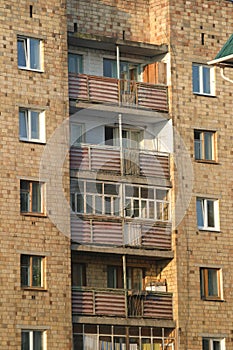 Balconies in the old many-storeyed house. Morning.