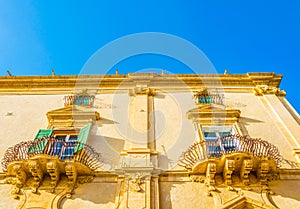 Balconies of Palazzo Nicolaci in Noto, Sicily, Italy