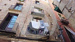 Balcony in Barcelona with hanging laundry