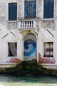 Balcony and Blue Door Entrance from Grande Canal in Venice, Italy