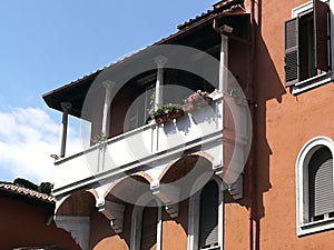 Balcony with flowers in the Garbatella district to Rome in Italy. photo