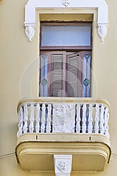 Balcony of Gomez Villa office building built in 1909 in eclectic style. Plaza Vieja, Havana, Cuba.