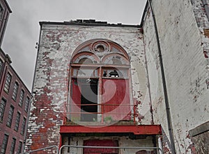 Industrial balcony in cotton mill Northern England with arches photo