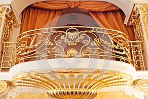 Balcony internal with gold furnish with gold stucco decorative