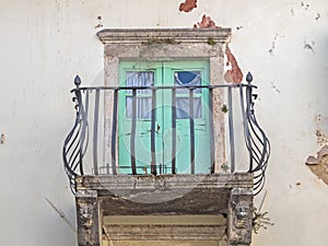 Balcony with iron balustrade at an old house in Croatia