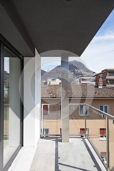 Balcony of modern building overlooking city