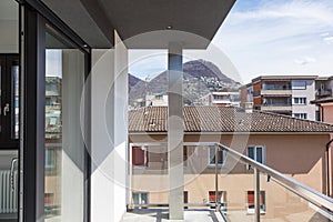 Balcony of modern building overlooking city