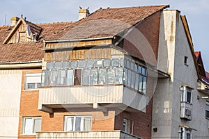 Balcony from old apartment block from communist era in Eastern Europe. Communist socialist architecture style flat.