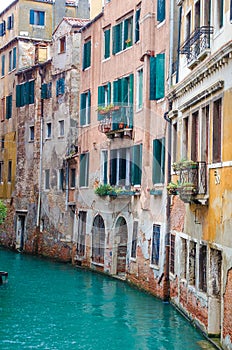 Balcony over lateral canal in Venetia photo