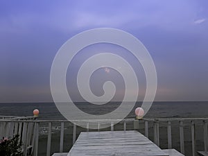 Balcony that overlooks the sea and blue sky