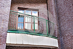 Balcony of the retro style townhouse.