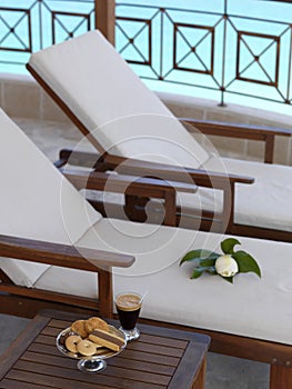 Balcony with sunbeds