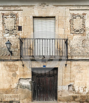 Balcony with two shields photo