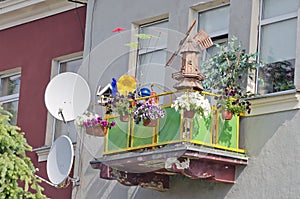 Balcony with various decorations in city