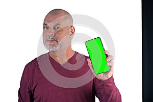 bald adult man showing cell phone handset technology edition