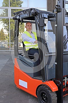 Bald Forklift Driver