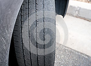 Bald front wheel tires on vehicle needing replacement