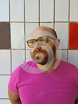 Bald man in eyeglasses with ugly teeth