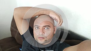 bald man mexican portraying himself