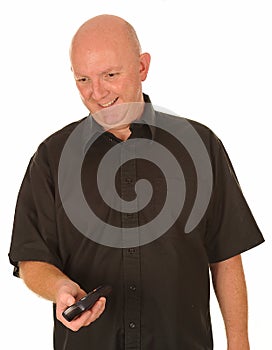 Bald man with remote