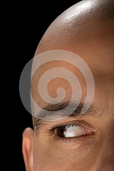 Bald man right eye