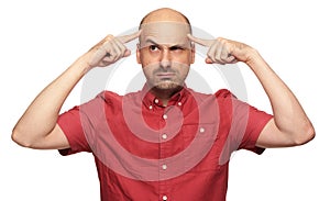 Bald man thinking hard about problems