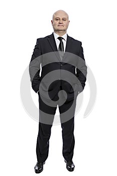 Bald middle-aged man in a suit in full growth. Vertical. Isolated on a white background