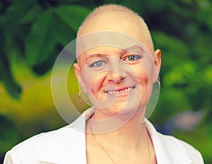 Bald woman - cancer survivor