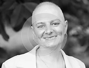 Bald woman - cancer survivor