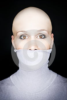 Bald woman turtleneck