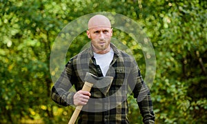 Bald woodsman. Harvest firewood. Hike vacation. Hike in forest. Forest care. Determination of human spirit. Man