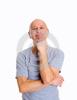 Baldheaded man in front of white background photo