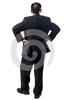 Balding man in Suit Arms Akimbo