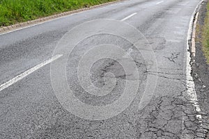 baldy damaged country road in Germany