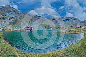 Balea Lake, a glacier lake situated at 2,034 m of altitude, FÄƒgÄƒraÈ™ Mountains, Romania