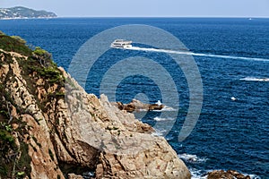 The Balearic sea in Spain. Soft Wave Of Blue Ocean On Sandy Beach. Background. Selective focus.Summer outdoor nature harmony. Summ